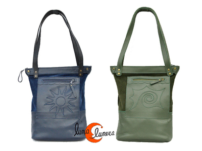 Bolso de piel estilo shopping para ordenador portátil. Con bolsillos por delante y detrás.  Se enseña el modelo, los colores pueden no coincidir con elproducto en venta.