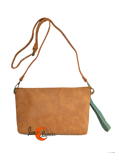 Bolsos que puede usarse por el lado marrón o de los colores