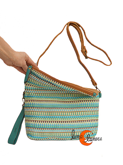 Bolsos que puede usarse por el lado marrón o de los colores.