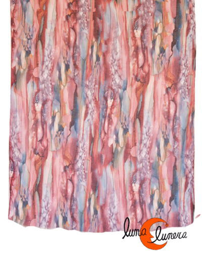 Pañuelo tipo fular de algodón y seda de con muchos y vistosos colores y un estampado que imita gotas de agua