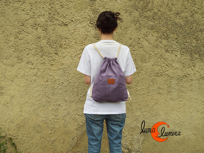 mochila mediana tipo morral que cierra con cuerdas