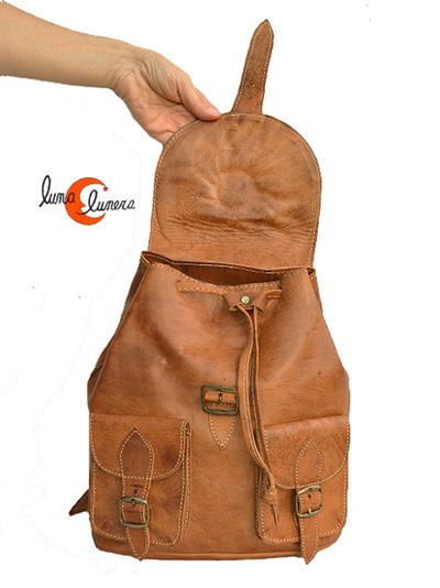 mochila de piel pequeña con sol