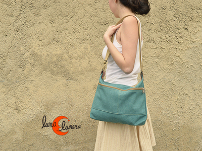 bolso de bandolera de tela mediano con bolsillos y cremalleras
