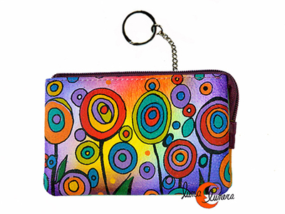 Esta fotografía enseña el modelo, los colores pueden no corresponder con el monedero que está en venta.