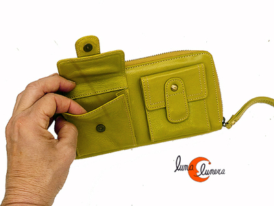 Esta fotografía enseña el modelo, los colores pueden no coincidir con la cartera que está en venta