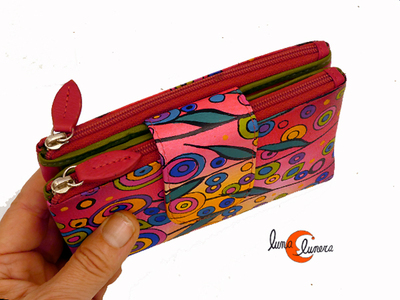 Esta imágen enseña el modelo, los colores pueden no coincidir con la cartera que está en venta.