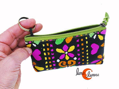 Los colores pueden no coincidir con el monedero que está en venta.