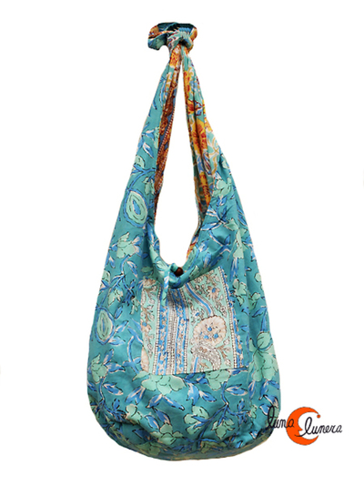 Interior bolso saco reversible.