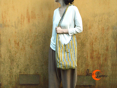 Se enseña el modelo, los colores son diferentes al bolso que está en venta