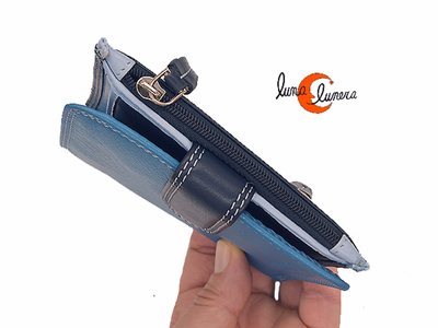 Esta foto enseña el modelo, los colores pueden no correspoder con la cartera que está en venta.