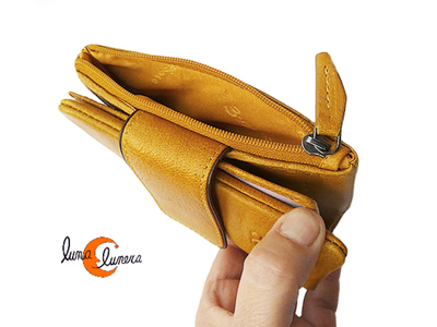 Esta imagen enseña el modelo, los colores pueden ser diferentes a la cartera que está en venta.