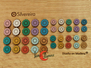 Pendientes de madera con base de plata. Dos tamaños: 1,1 y 0,8 cm. respectivamente.
