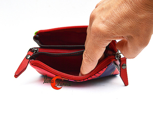 Esta imagen muestra el modelo, los colores pueden no coincidir con el monedero que está en venta.