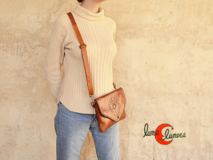 Bolso de mano de piel tipo sobre, también se puede usar como bandolera