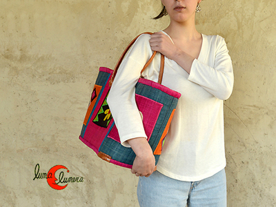 Capazo grande de colores con asas de cuero