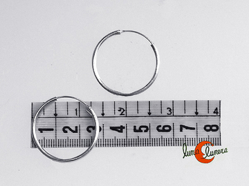Aros de plata medianos finos (1,5 mm. por 3 cm.) 013