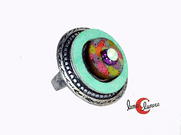Colección Malagata. Bisutería de zamak con swarovsky, anillo ajustable por detrás  turquesa y colorines.