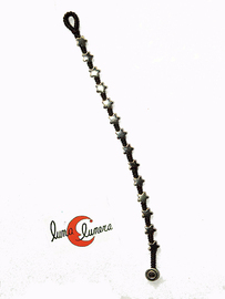 Pulsera tejida de macramé con abalorios de zamak. estrellas pequeñas.