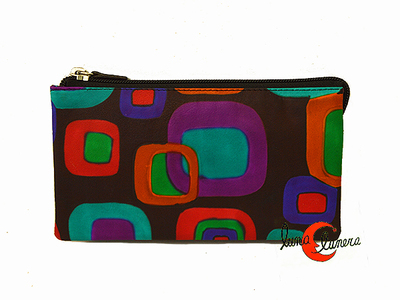 Cartera monedero de piel de colores grande de la casa Belmonte con compartimentos y cierre cremallera.