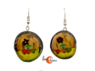 Pendientes de semillas de Mucuna y resina. Amarillos.