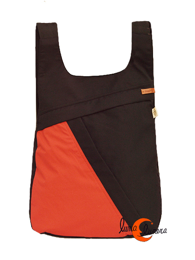 Impermeables. Mochilas de tela Mugling. Mochila redonda caldera lado izquierdo.
