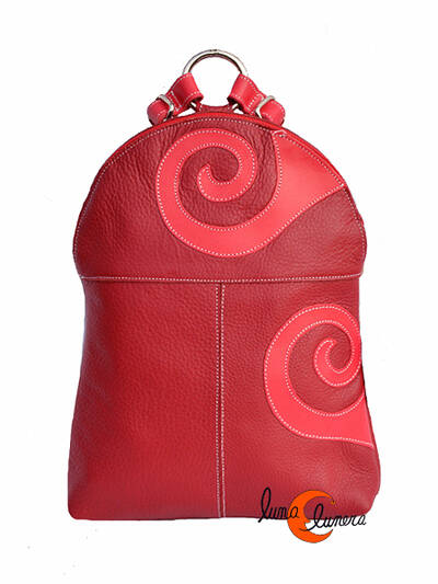 Arteycuero, mochila pequeña redonda roja con espirales.