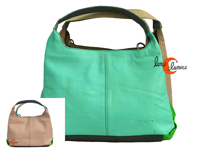 Soruka, bolso de mano mano de piel doble, turquesa y bisón.