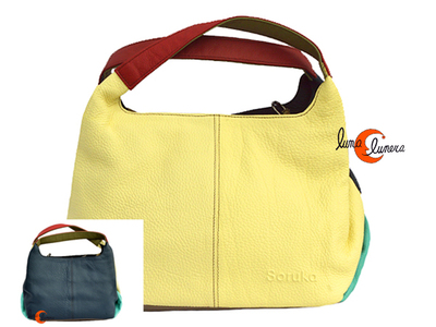 Soruka, bolso de mano mano de piel doble, vainilla y azul marino.