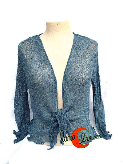 Chaquetas, rebecas de punto. Color azul acero.