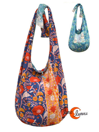 Bolso de tela con forma de saco con asa ancha REVERSIBLE grande, azul con flores rojas.