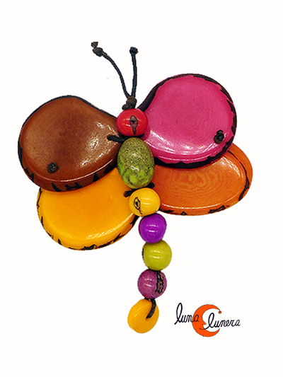 Broche de semillas de tagua. Mariposa multicolor colores cálidos.