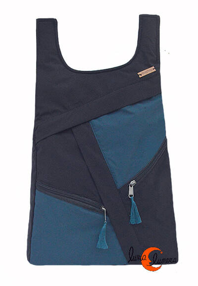 Impermeables. Mochilas de tela Mugling. Mochila redonda cremalleras azul oscuro.