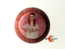 Broche colección Noa-ecco. Broche redondo de resina con imagen modernista en tonos rosa.