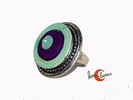 Colección Malagata. Bisutería de zamak con swarovsky, anillo ajustable por detrás  turquesa y morado.