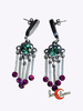 Colección Malagata. Bisutería de zamak con swarovsky, pendientes con flor y flecos con cristales en tonos azules ymorados.