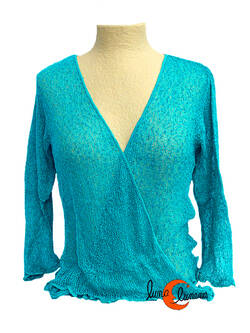 Chaquetas, rebecas de punto. Turquesa muy intenso.
