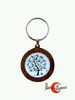 Llavero de madera y cristal, árbol con pájaros verdes.