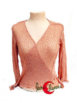 Chaquetas, rebecas de punto. Color rosa palo empolvado.