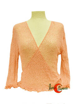 Chaquetas, rebecas de punto. Color damasco pastel.