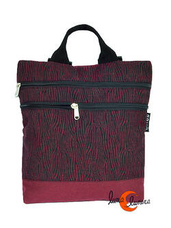 Mochilas de tela BRUO. Mochila pequeña reversible antirrobo, print cebra granate.