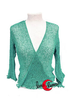 Chaquetas, rebecas de punto. Color azul turquesa.