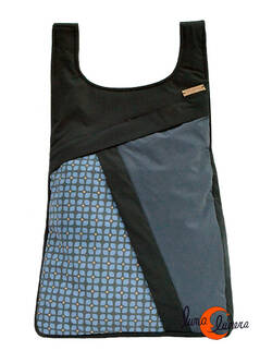 Impermeables. Mochilas de tela Mugling. Mochila redonda dibujos azul.