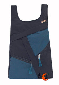 Impermeables. Mochilas de tela Mugling. Mochila redonda cremalleras azul oscuro.