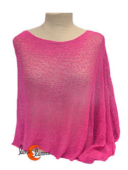 Poncho de punto. Rosa palo fuerte.